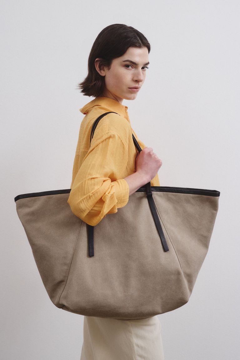 Borsa da viaggio in canvas di cotone con profili in pelle