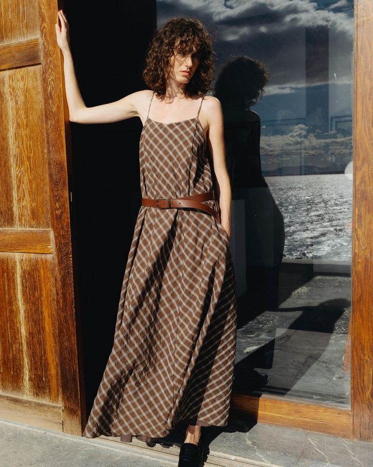A long cotton madras dress that flows with every step. 

 Available in boutique at 26 rue Saint Sulpice, Paris and online at pomandere.com

#POMANDÈRE #SS26