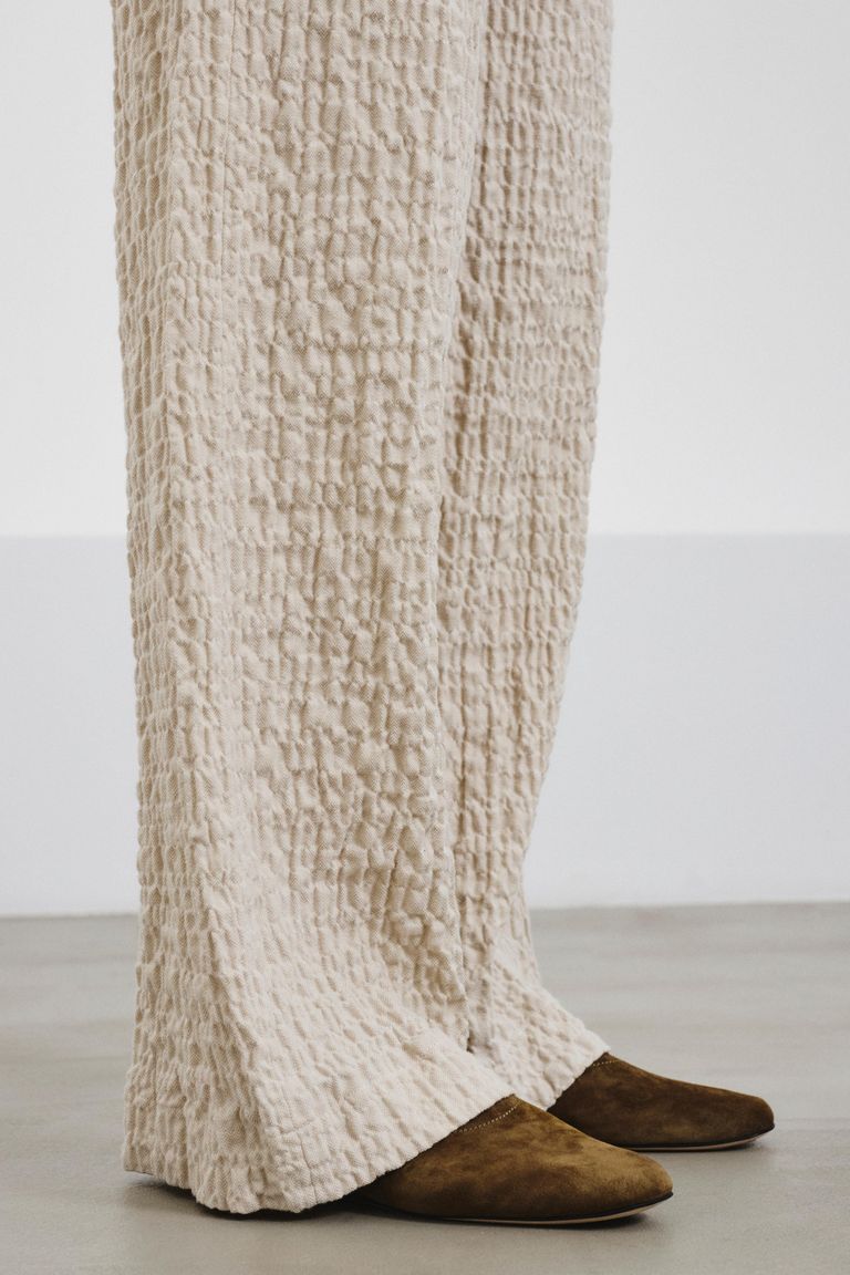 Trousers in embossed micro-herringbone cotton ivory