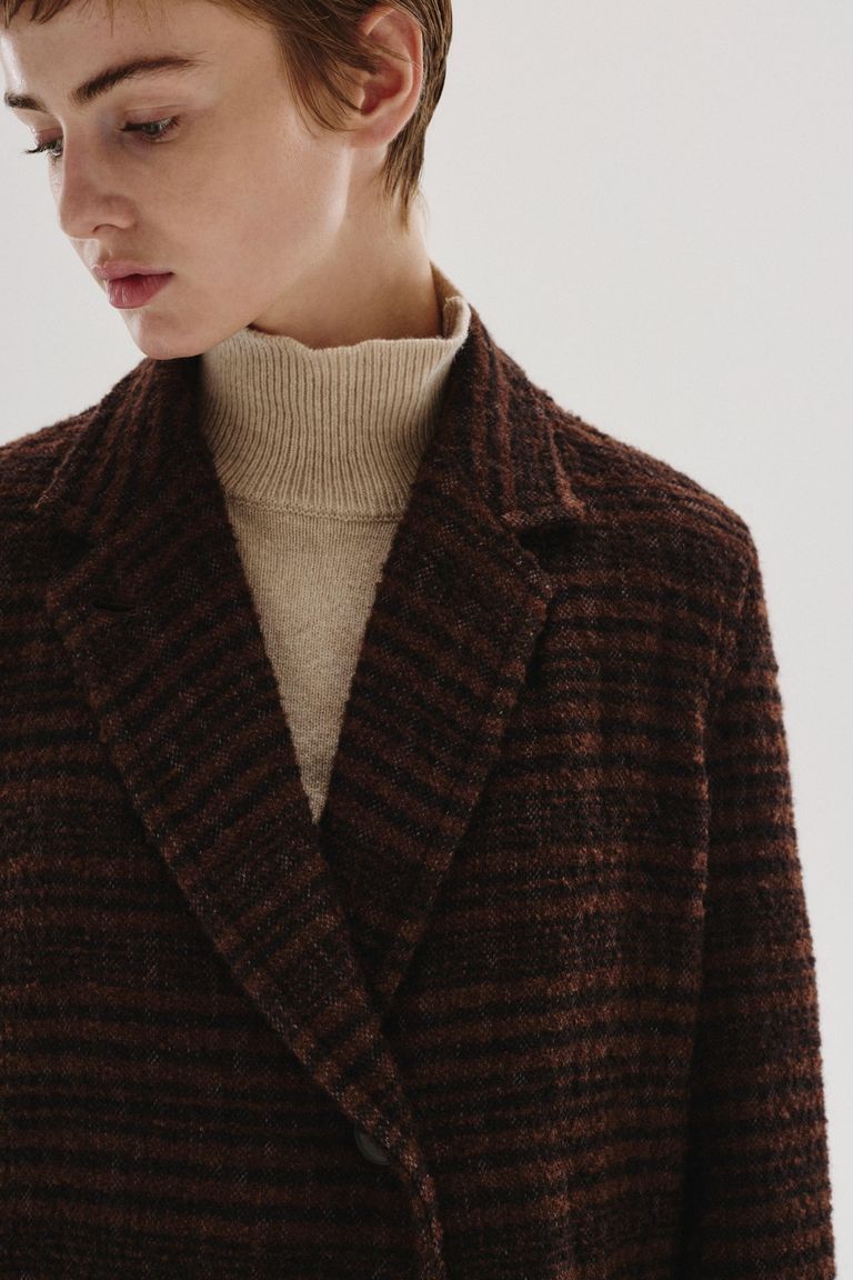 Manteau en drap de laine bouclée rayé